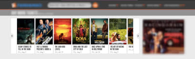 The Fandango home page shows a slider with popular movies and their posters