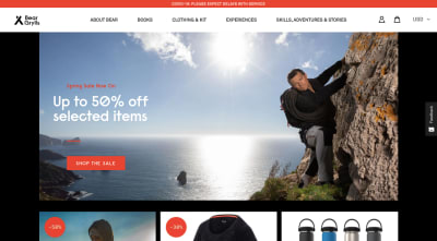 Bear Grylls website with adventure nature imagery, strong black and red accents