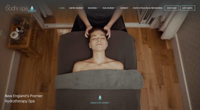 Bodhi Spa website - woman receives deep neck and head massage